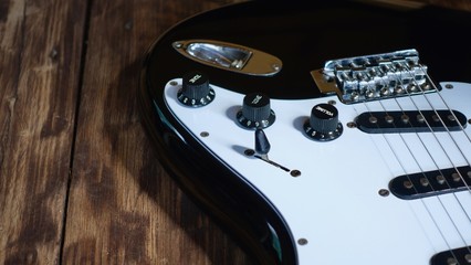 electric guitar on the wooden boards
