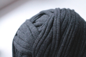 Close up view of black clew thread for knitting