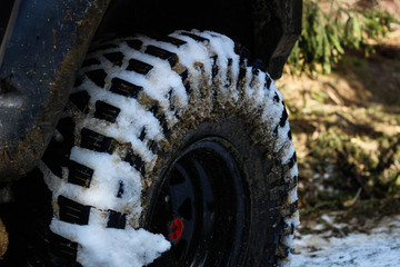 Wheels in the marsh. Offroad on Jeep in the Carpathian Mountains
