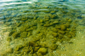 Ocean sea bottom floor rocky coast with clean see-through water