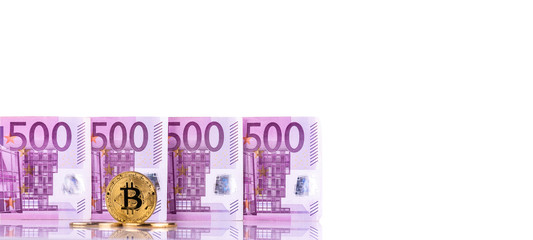 Euro money 500 bank notes and bitcoin golden symbol background