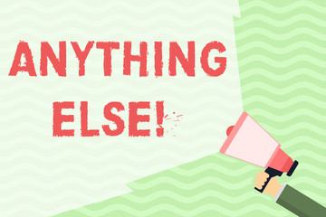 Conceptual hand writing showing Anything Else. Concept meaning can be of assistance or any further information required Hand Holding Megaphone with Wide Beam Extending the Volume