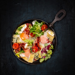 Fried bacon and sunny side up eggs