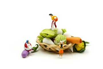 Miniature people : Wifehouse woman's Sell Harvest Products Farm Assortment of fresh fruits and vegetables Market Seasonal Sale.