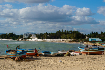 Fototapeta na wymiar Fisherman's boat at beach in Tunisia, Hammamet Tunisia
