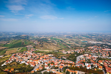 Fototapeta na wymiar Modern San Marino Suburban districts and hills view from above.
