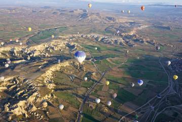 Panoramic view of Goreme beautiful landscape with hot air balloon floating in the sky