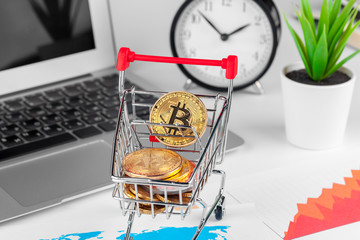 Bitcoin in mini shopping cart