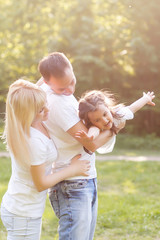 happy family having fun outdoors