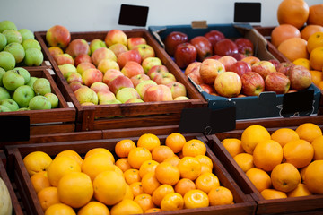 Shelf in the vegetable store with different kinds of fruit