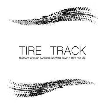 Black grunge tire tracks and sample text isolated on white background