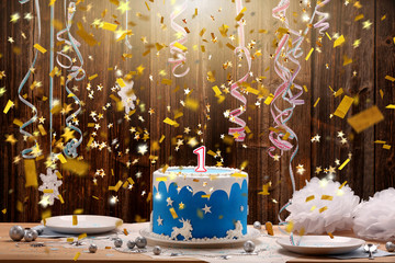 Birthday cake with one candle and confetti