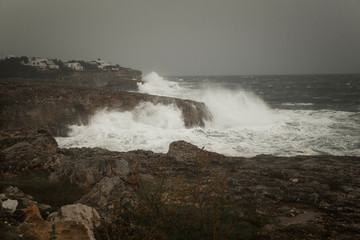 Waves crashing on rocks