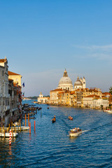 Naklejka premium Boats at sunrise in venice, Beautiful view on Grand Canal in romantic Venice,Italy