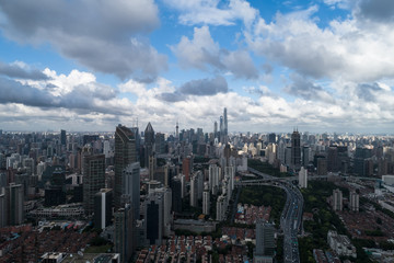 Fototapeta na wymiar Aerial view of business area and cityscape in the afternoon, West Nanjing Road, Jing`an district, Shanghai