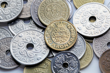 Naklejka premium Selection of mixed Danish Kroner coins from directly above - The Krone is the official currency of Denmark. 