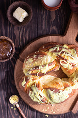 Swirl brioche with citrus glaze. Braided or roll bread, Babka. 