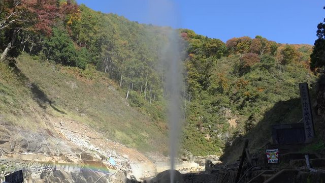 Hot geyser in the Jigokudani Monkey Park at autumn.  Yamanouchi, Nagano Prefecture, Japan