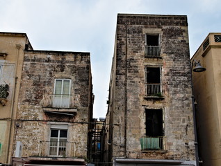 Abandoned, uninhabited and dilapidated buildings in the old town of Taranto, Puglia, Italy.