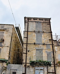 Abandoned, uninhabited and dilapidated buildings in the old town of Taranto, Puglia, Italy.