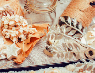 a lot of sea theme in mess like shells, candles, perfume, girl stuff on linen, pretty textured post card view vintage