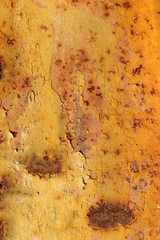 Blurred abstract background.Texture of the old rusted iron surface. Cropped shot, vertical, place for text, nobody, close-up. The concept of construction and design.