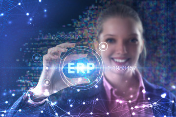 The concept of business, technology, the Internet and the network. A young entrepreneur working on a virtual screen of the future and sees the inscription: ERP