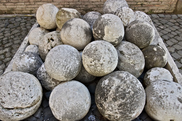 Cannon balls in white marble. A pile of marble balls used for ca