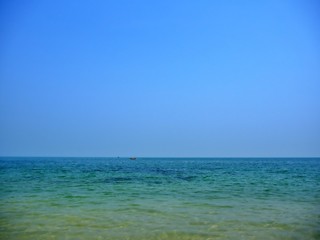 The landscape of the sea wave with clear blue sky and colorful sea water color in summer, Thailand