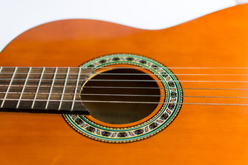 Fototapeta premium Classic acoustic guitar on white background view.
