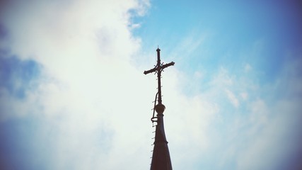 Cross on blue sky