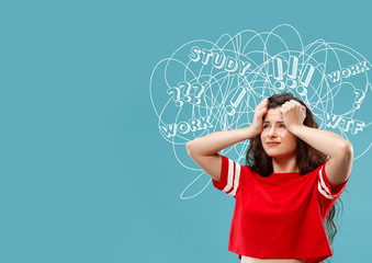 Young caucasian woman with mixed thoughts against blue studio background. Negative space. Concept of thinking confusion, stress out, misunderstanding, facial expression, human emotions.