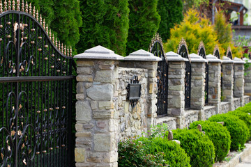 Wrought-iron gates, ornamental forging, forged elements close-up.