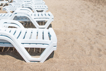 Obraz premium Beach chairs on white sand beach in Odessa, Ukraine. Black Sea