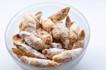 Cornulețe. A traditional Romania dessert that is a small croissant stuffed with jam or Turkish delight sprinkled with icing sugar