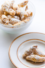Cornulețe. A traditional Romania dessert that is a small croissant stuffed with jam or Turkish delight sprinkled with icing sugar