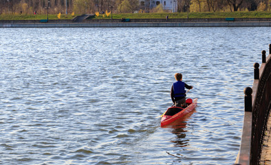 a man is riding a kayak