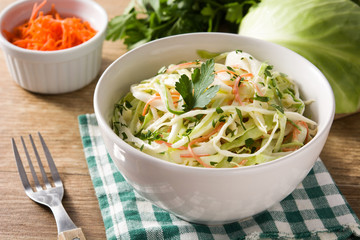 Coleslaw salad in white bowl