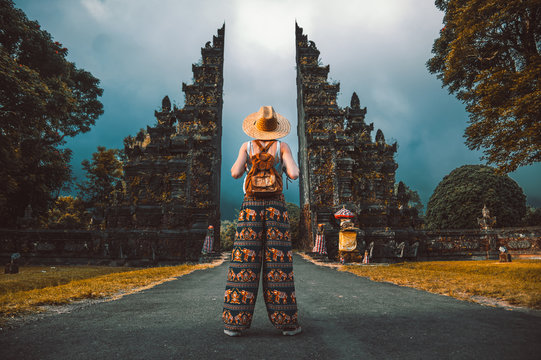 Traveller Woman Posing In Front Of A Temple In Asia