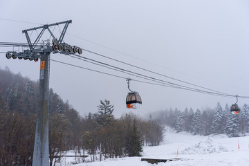 Cable car sky on snow mountain at Sapporo , Hokkaido, japan.