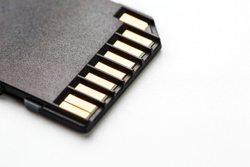 Black SD memory card on a white background, isolate