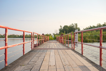 A wooden bridge across a waterway