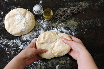 Homemade dough for bread or pizza. Italian pastries.