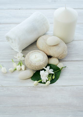 Spa setting on white wooden background