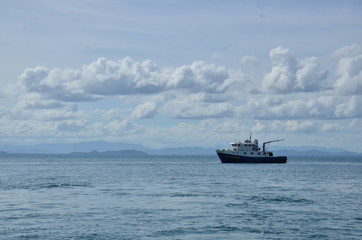 Obraz premium Small fishing boats in the sea