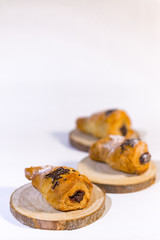 Three mini croissants with chocolate