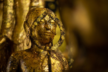 Golden buddish state in the art style at watbangpleeyainai temple ,Samutprakan ,Thailand