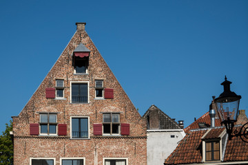 Facade, Dutch house with shutters in street Bergstraat. Deventer, The Netherlands