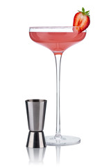 Margarita cocktail in a beautiful glass on a high leg with a half of fresh strawberries and a measuring Cup of the bartender, isolated on white. 100 per cent sharpness. Quality image.