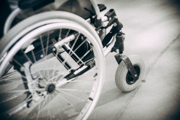 close up view of wheelchair with person outdoor